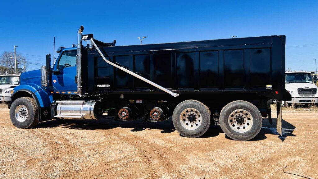 Close-up of the International Quad Axle Dump Body with reinforced AR450 steel floor and 8-inch apron