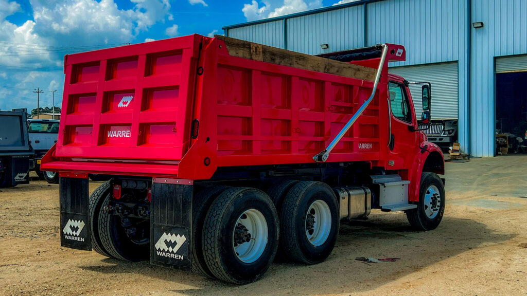 Detailed shot of MSF-13.5-4248 package dump body on Freightliner chassis
