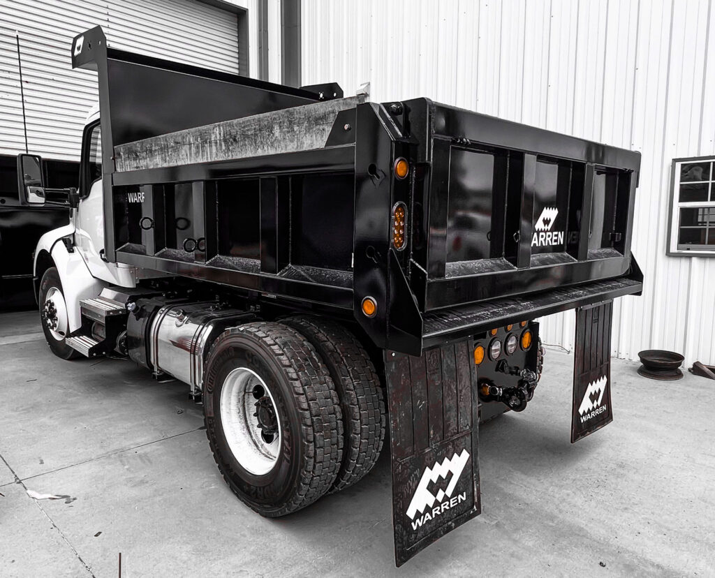 Municipal dump truck U-10-2430 mounted on a clean white Kenworth ready for city crew operations