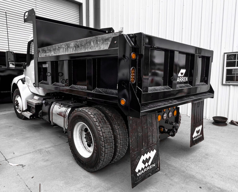 Municipal dump truck U-10-2430 mounted on a clean white Kenworth ready for city crew operations
